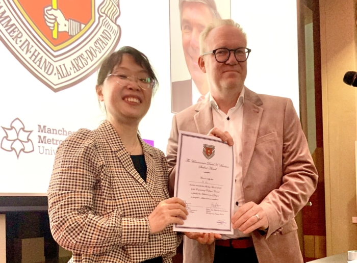 Ya He receives Hammermen David K Harrison Award from Prof John Mitchell, EPC President